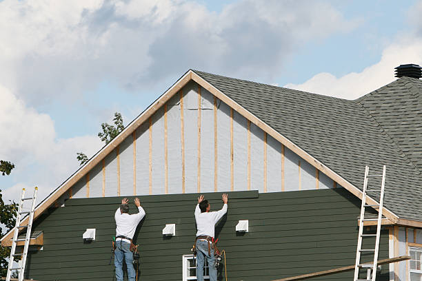 Professional Siding Contractor technician working in Carlton, PA